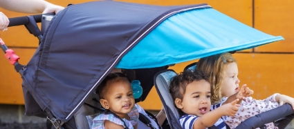The Compass Quad Four Child Stroller Has a Large Canopy to Provide Shade and Weather Protection.