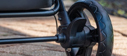 This 4 Passenger Quad Stroller has a Convenient Foot Brake Pedal for Worry-Free Parking