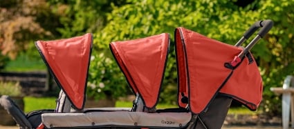 The Compass Trio Triple Stroller Features Roomy Stadium Seating