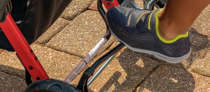 The Compass Trio Triple Stroller has an Easy to Operate Foot Brake.